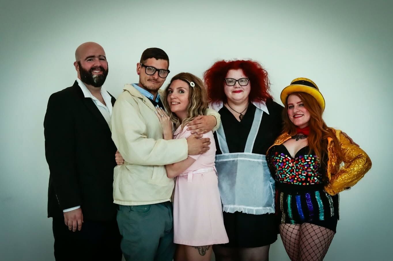 Brad, Janet, Magenta, Columbia and Dr. Scott in a studio portrait