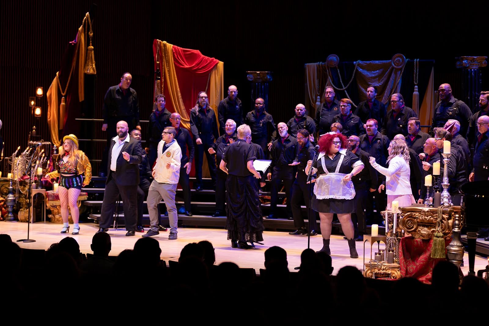 Wide stage shot with the full chorus and cast
